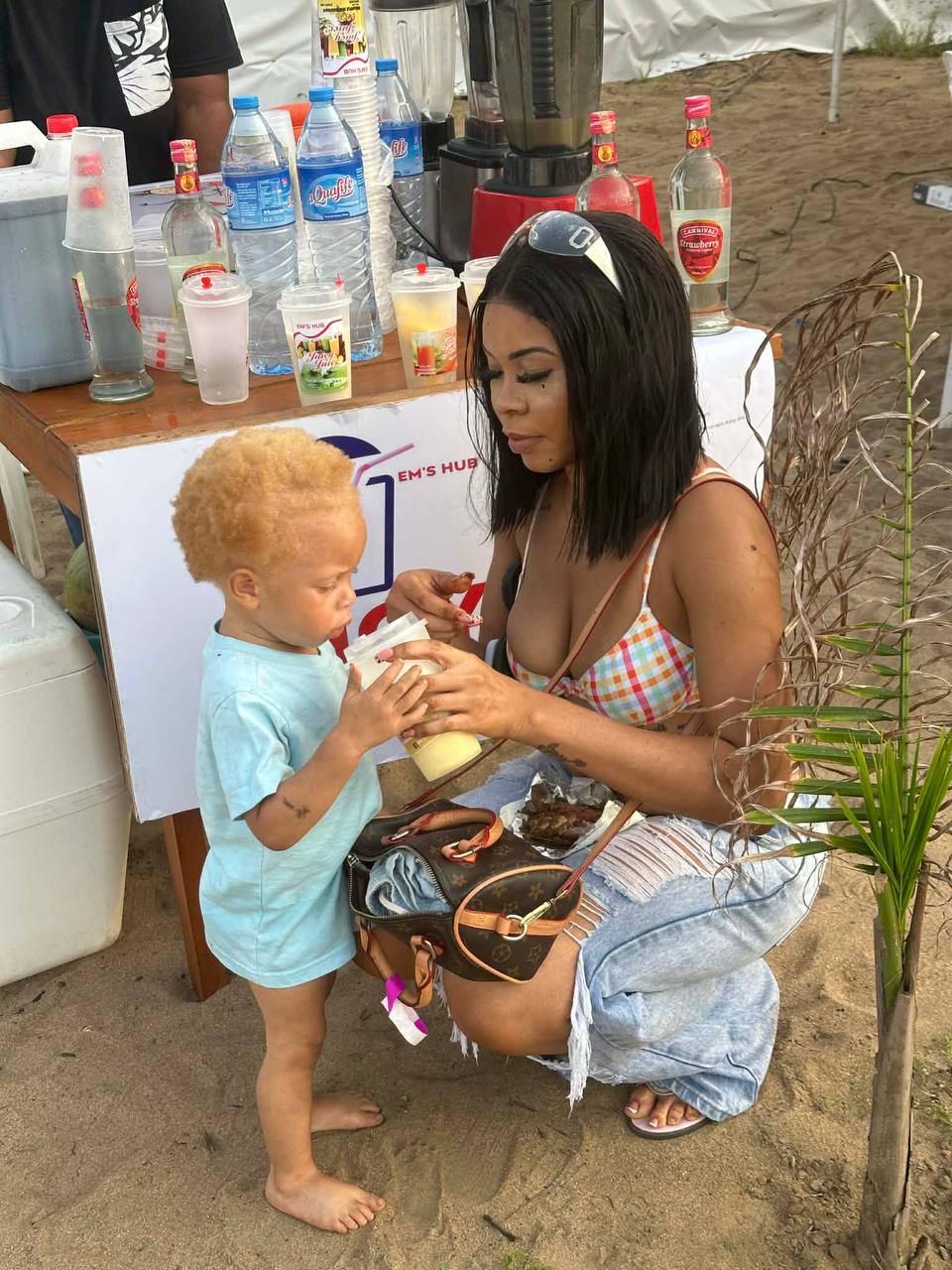 Young Juicy Juice customer holding a fresh drink